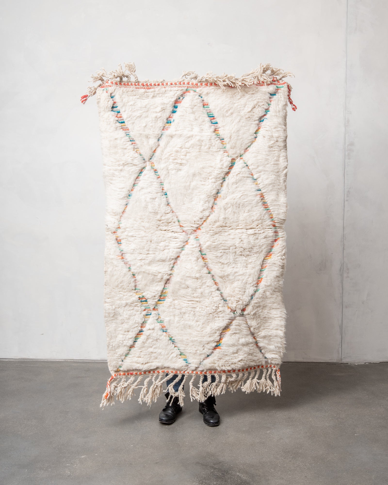 Modern, designer, handcrafted Berber rug from Morocco. Beniourain carpet with beautiful colours and patterns and fluffy wool texture.